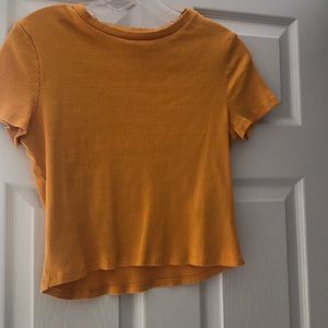 Divided yellow ribbed crop top